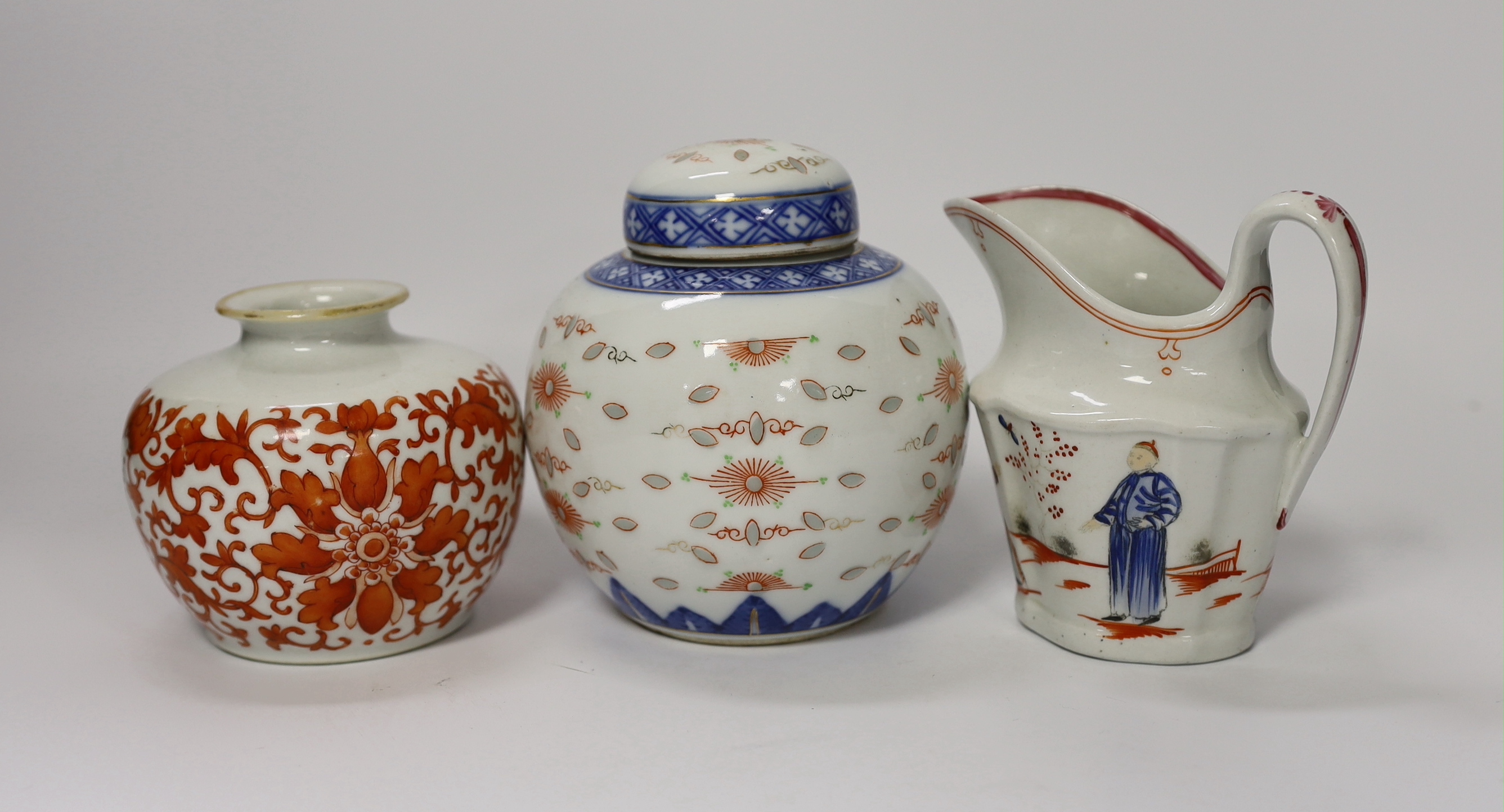 A late 18th century Newhall type jug, an early 20th century Chinese underglaze copper jar, a jar and cover and a glass snuff bottle